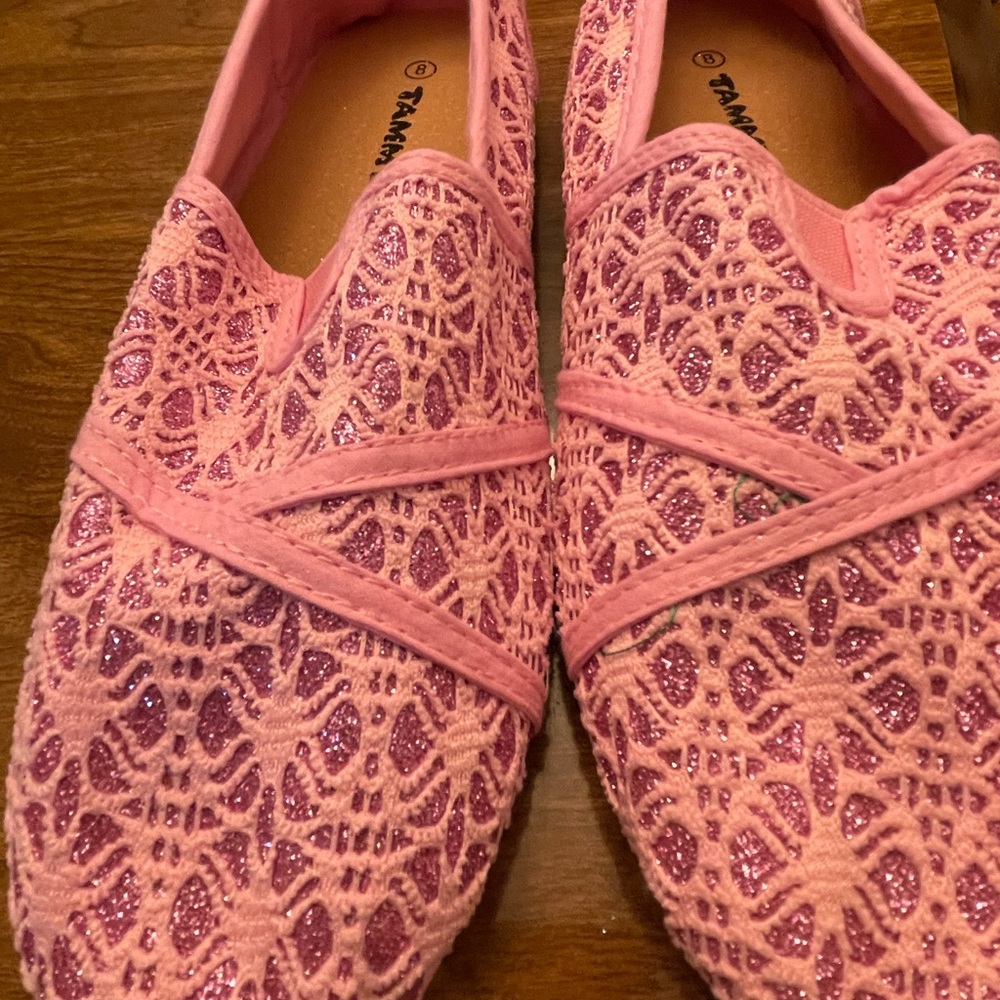Never worn slipons. Pink metallic lace design